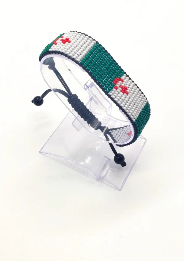 Handcrafted Algeria flag bracelet featuring green and white vertical stripes, made with beaded design, adjustable wrist accessory, displayed on a Clear stand.