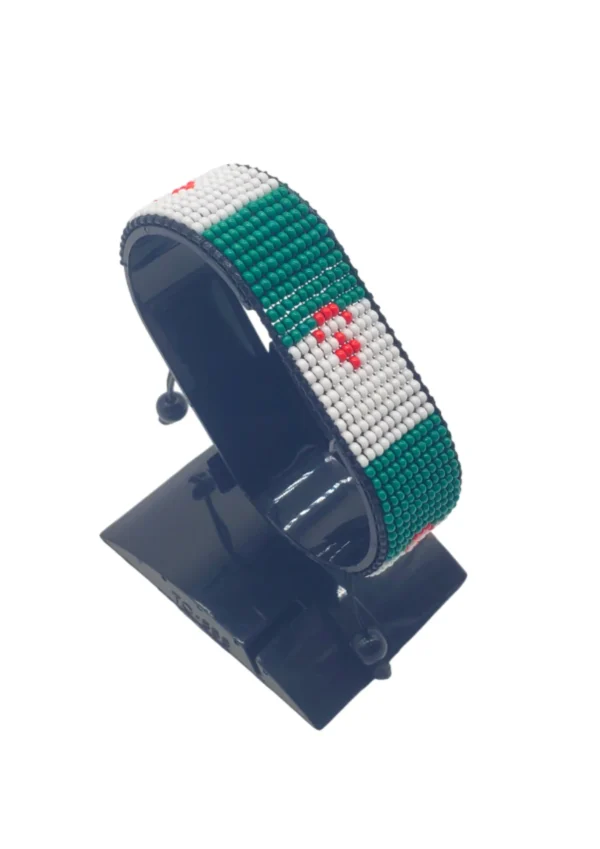 Handcrafted Algeria flag bracelet featuring green and white vertical stripes, made with beaded design, adjustable wrist accessory, displayed on a black stand.