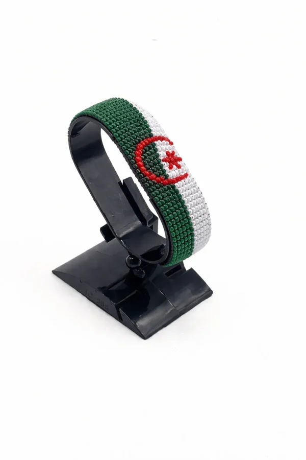 Handcrafted Algeria plain flag bracelet made with green, white, and red beads, adjustable beaded wrist accessory, displayed on a black stand.