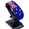 Handcrafted Australia flag bracelet made with blue, red, and white beads, featuring a custom name, adjustable beaded wrist accessory, displayed on a black stand.