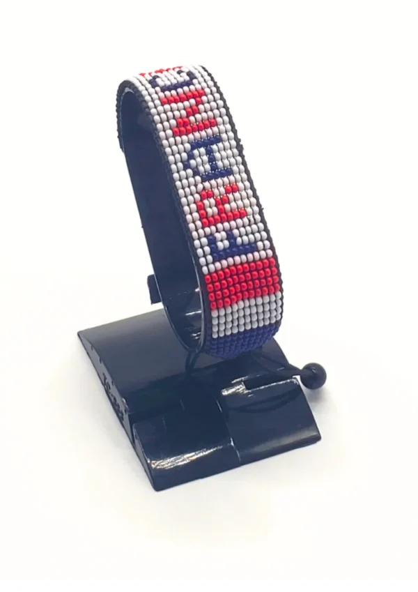 France flag bracelet handcrafted in authentic flag colors on Black Stand.