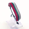 Bulgaria flag bracelet handcrafted in authentic flag colors on Clear Stand.