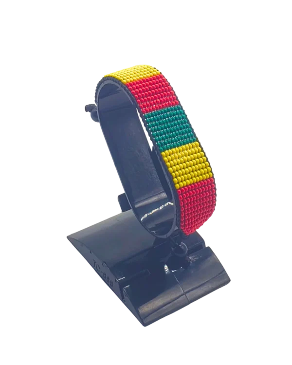 Cameroon flag bracelet handcrafted in authentic flag colors on Black Stand.