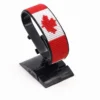 Canada flag bracelet handcrafted in authentic flag colors on Black Stand.