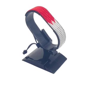 Canada flag bracelet handcrafted in authentic flag colors on Black Stand.