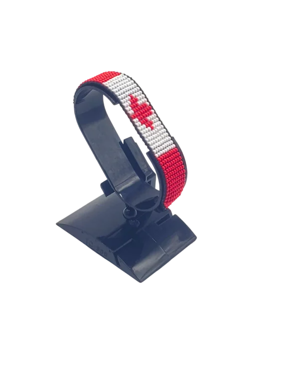 Canada flag bracelet handcrafted in authentic flag colors on Black Stand.