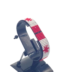 Canada flag bracelet handcrafted in authentic flag colors on Black Stand.