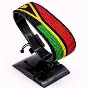 Handcrafted Vanuatu flag bracelet, adjustable beaded wrist accessory, displayed on a black stand.