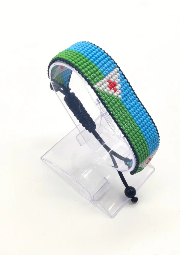 DJIBOUTI flag bracelet handcrafted in authentic flag colors on Clear Stand.