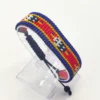 Eswatini flag bracelet handcrafted in authentic flag colors on Clear Stand.