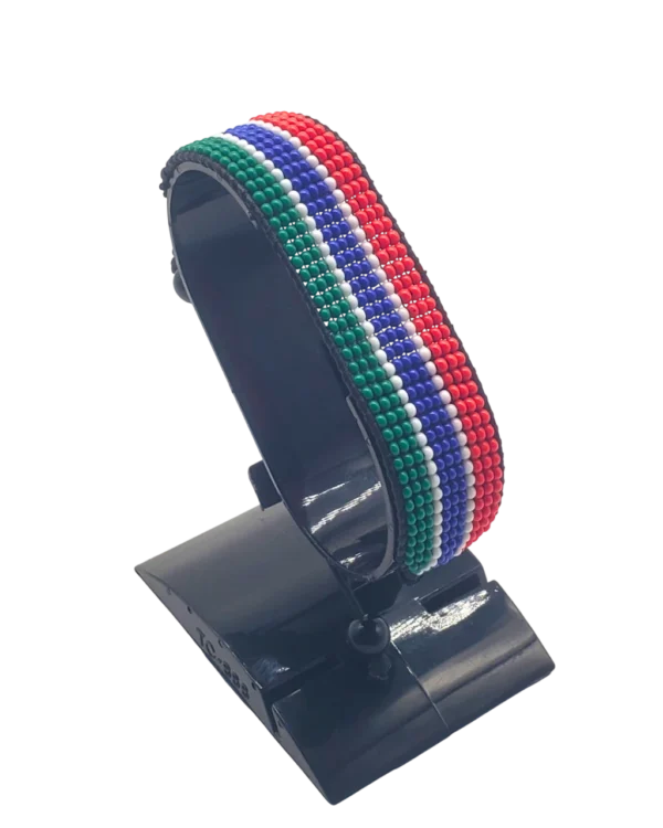 Gambia flag bracelet handcrafted in authentic flag colors on Black Stand.