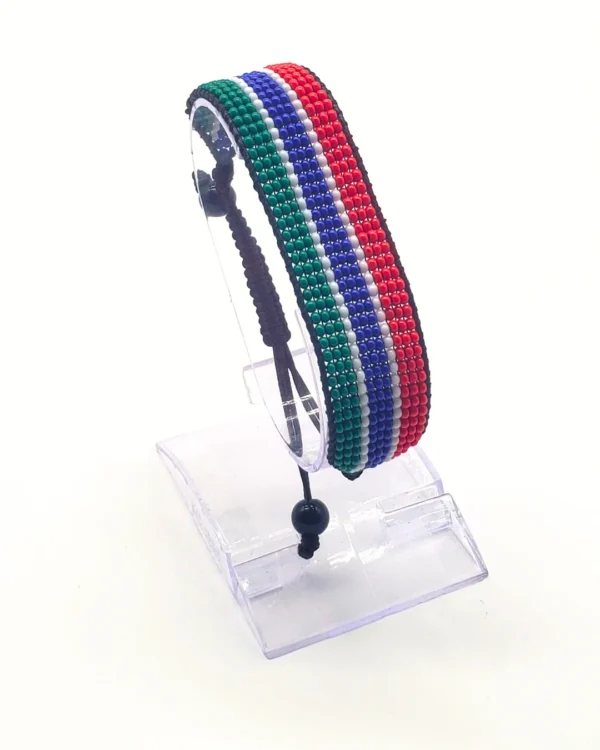 Gambia flag bracelet handcrafted in authentic flag colors on Clear Stand.