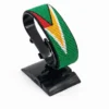 Handcrafted Guyana flag bracelet made with red and white beads, adjustable beaded wrist accessory, displayed on a black stand