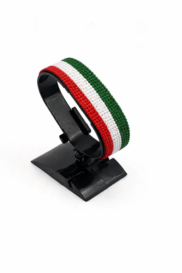 Handcrafted Hungary flag bracelet made with red and white beads, adjustable beaded wrist accessory, displayed on a black stand