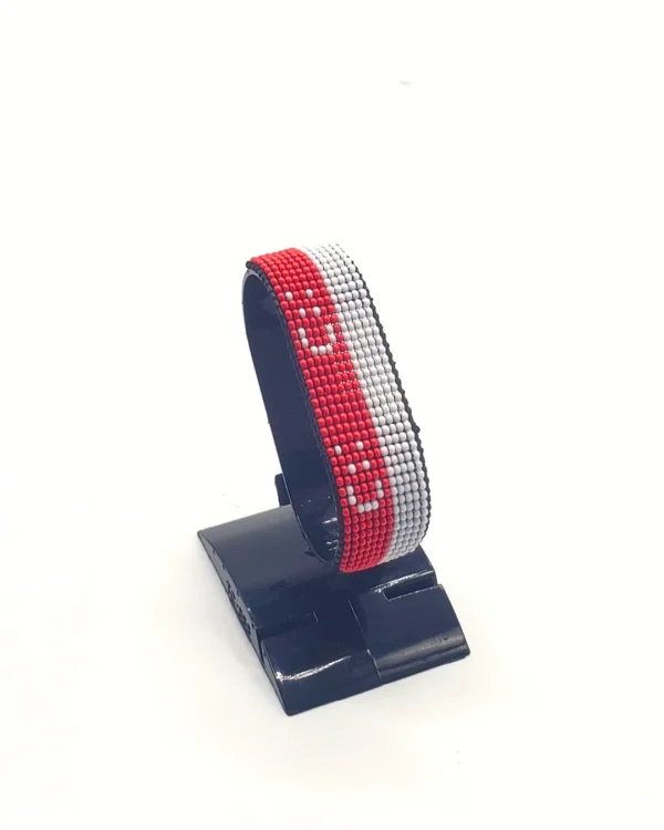 Indonesia flag bracelet handcrafted in authentic flag colors on Black Stand.