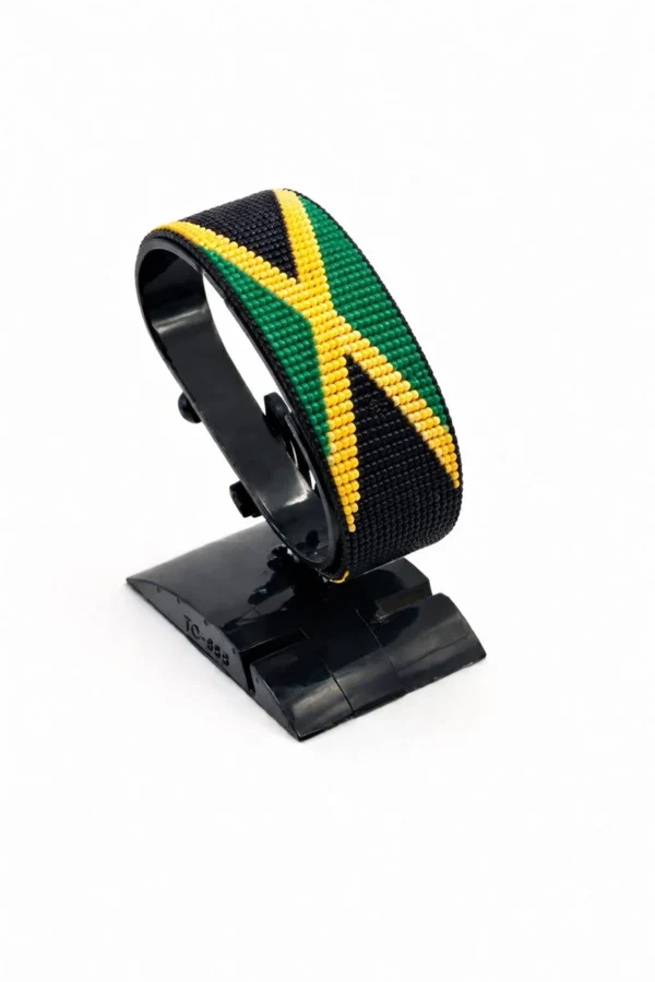 Jamaica flag bracelet handcrafted in authentic flag colors on Black Stand.