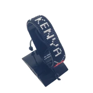 Kenya name flag bead bracelet with adjustable fit displayed on a Black stand