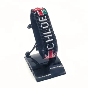 Kenya name flag bead bracelet with adjustable fit displayed on a Black stand