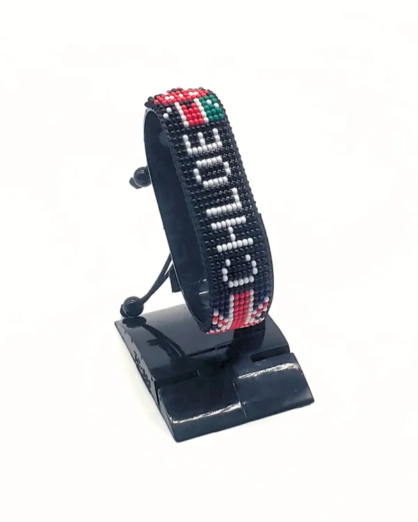 Kenya name flag bead bracelet with adjustable fit displayed on a Black stand