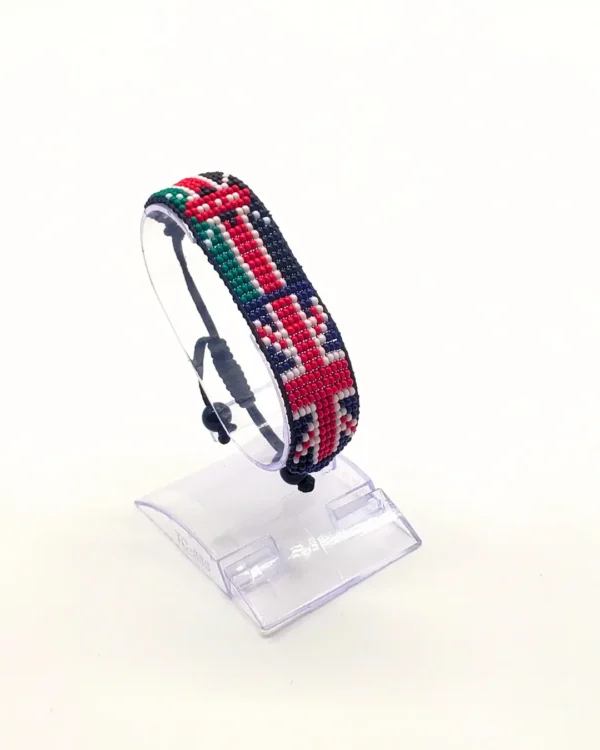 Kenyan UK combo flag bead bracelet with adjustable fit displayed on a Clear stand