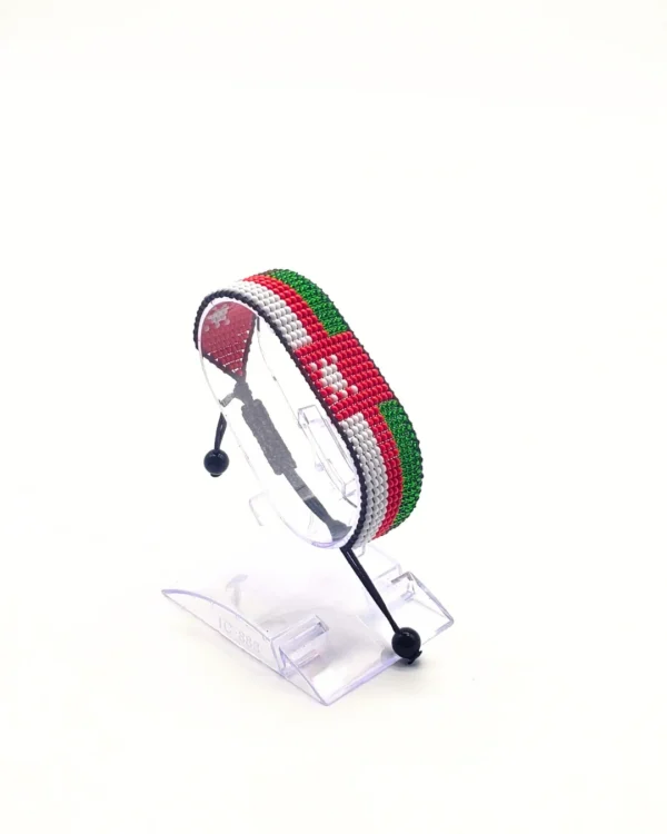 Lebanon flag bracelet handcrafted in authentic flag colors on Clear Stand.