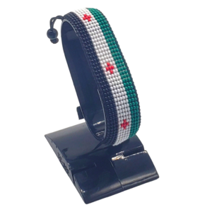 Palestine flag bracelet handcrafted in authentic flag colors on Black Stand.