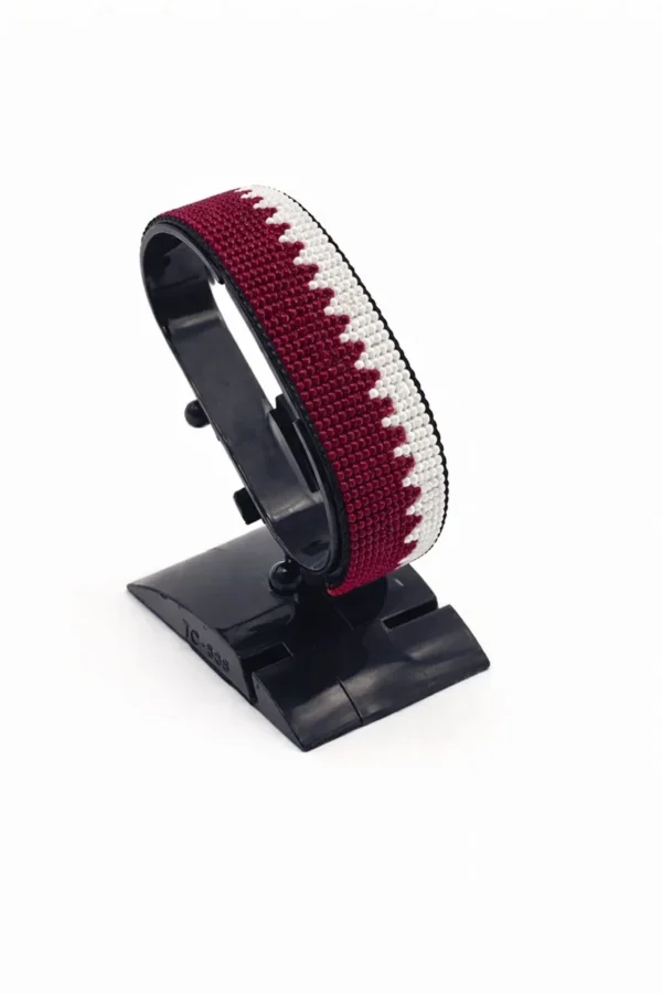 Qatar flag bracelet handcrafted in authentic flag colors on Black Stand.