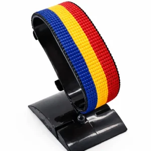 Handcrafted Romania flag bracelet made with red and white beads, adjustable beaded wrist accessory, displayed on a black stand