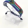 South Africa flag bracelet handcrafted in authentic flag colors on Clear Stand.