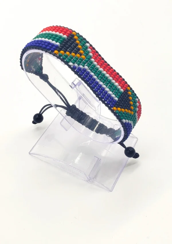 South Africa flag bracelet handcrafted in authentic flag colors on Clear Stand.