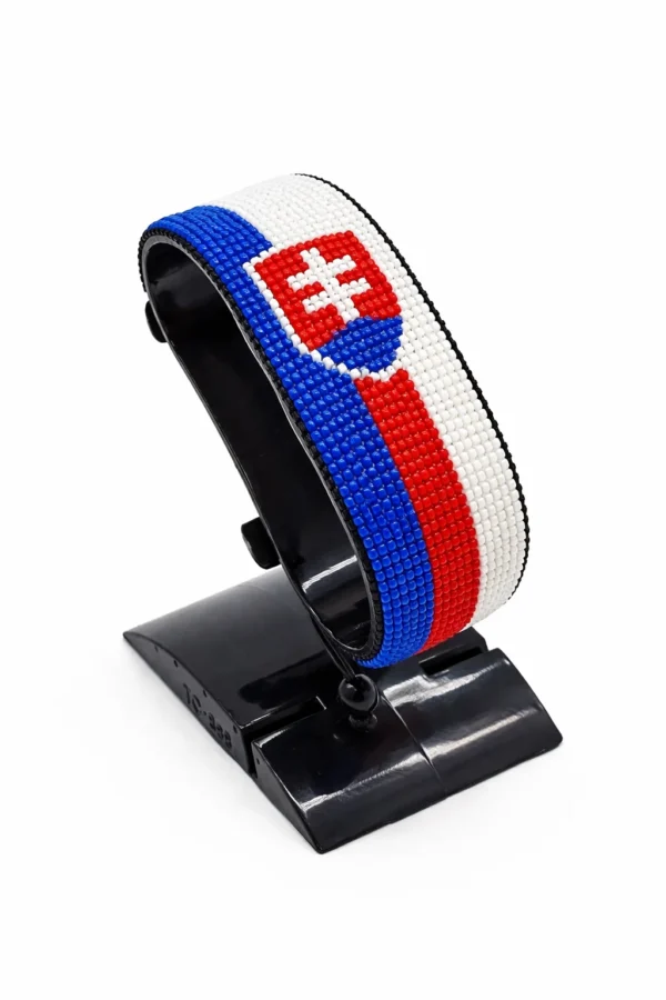 Handcrafted Slovekia flag bracelet made with red and white beads, adjustable beaded wrist accessory, displayed on a black stand