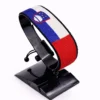 Handcrafted Slovenia flag bracelet made with red and white beads, adjustable beaded wrist accessory, displayed on a black stand