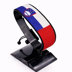Handcrafted Slovenia flag bracelet made with red and white beads, adjustable beaded wrist accessory, displayed on a black stand