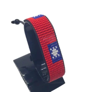 Handcrafted Taiwan flag bracelet, adjustable beaded wrist accessory, displayed on a black stand.