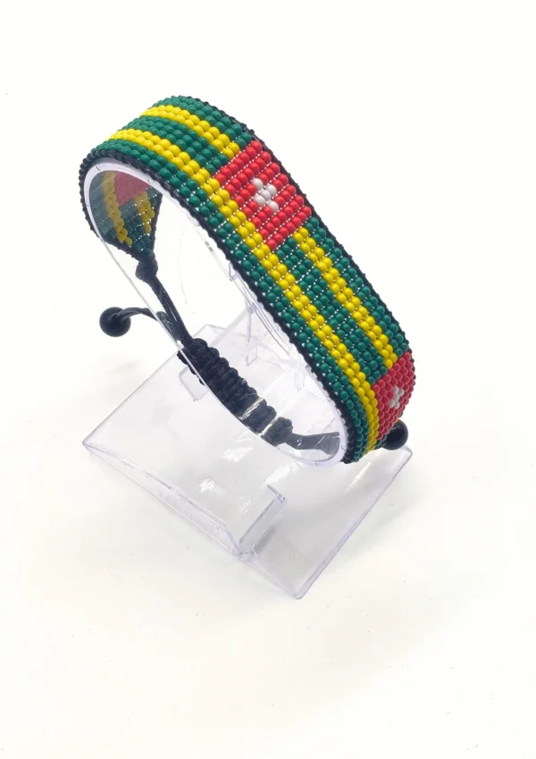 Handcrafted Togo flag bracelet with Name, adjustable beaded wrist accessory, displayed on a Clear stand.