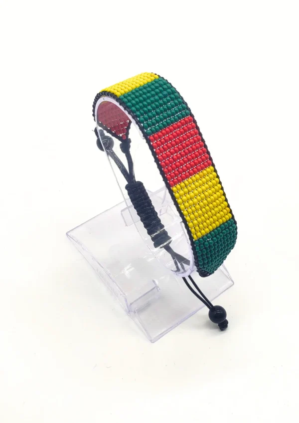 Handcrafted Togo flag bracelet with Name, adjustable beaded wrist accessory, displayed on a Clear stand.