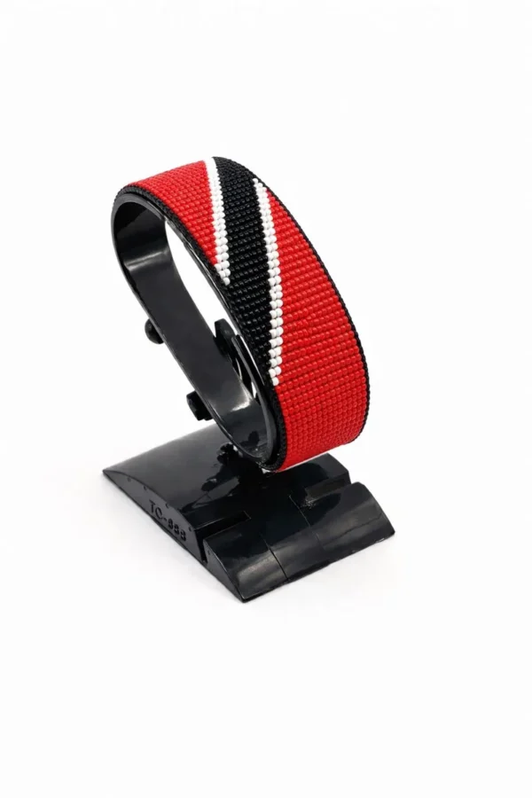 Handcrafted Trinidad & Tobago flag bracelet with Name, adjustable beaded wrist accessory, displayed on a black stand.