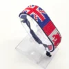 Canada UK flag bracelet handcrafted in authentic flag colors on Clear Stand.