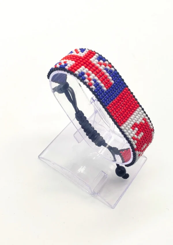 Canada UK flag bracelet handcrafted in authentic flag colors on Clear Stand.