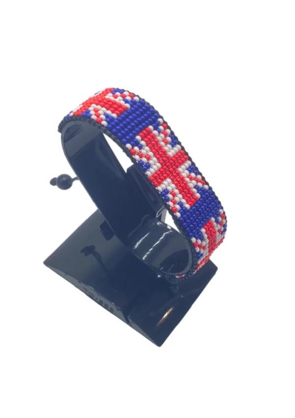 UK flag bracelet handcrafted in authentic flag colors on Black Stand.