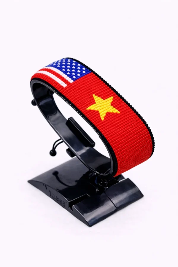 Vietnam USA combo flag bracelet with red, yellow, and American flag beads, handcrafted adjustable beaded wrist accessory.