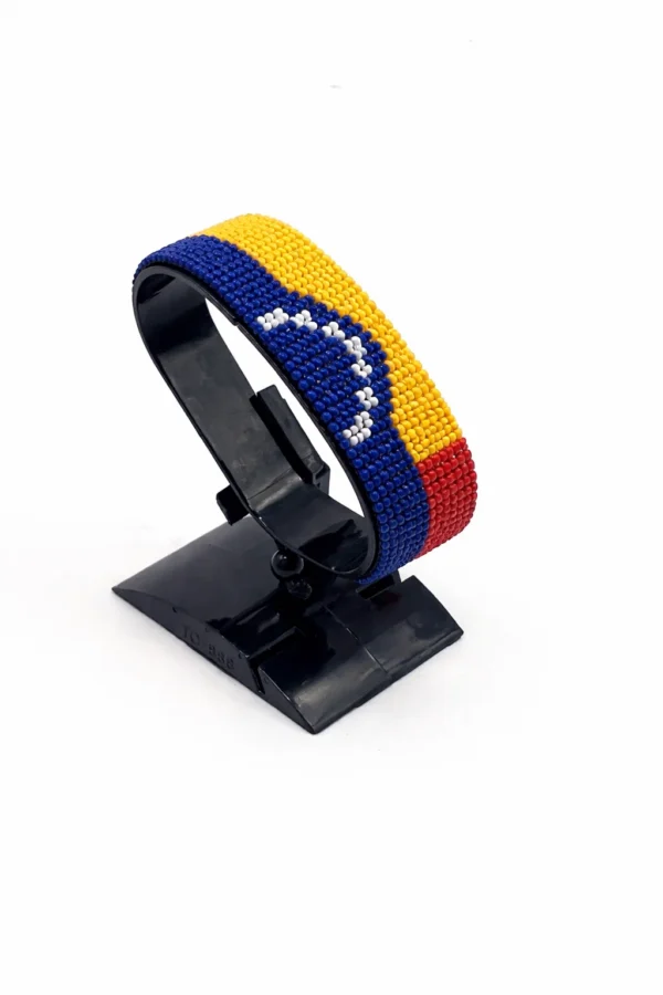 Venezuela flag bracelet with vibrant red, yellow, and blue beads, handcrafted adjustable wrist accessory.