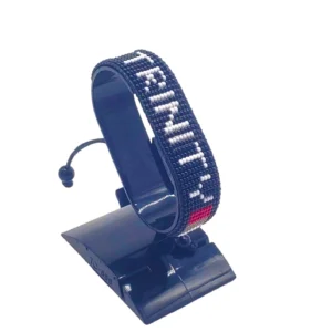 Trinity Flag bracelet handcrafted in authentic Corporate colors on Black Stand.