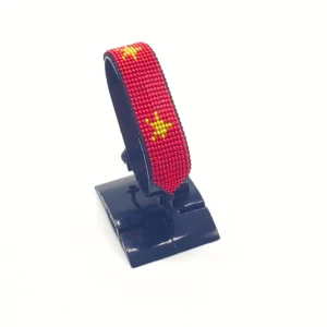 China flag bracelet handcrafted in authentic flag colors on Black Stand.
