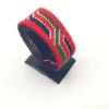 Kenya flag bracelet handcrafted in authentic flag colors on Black Stand.