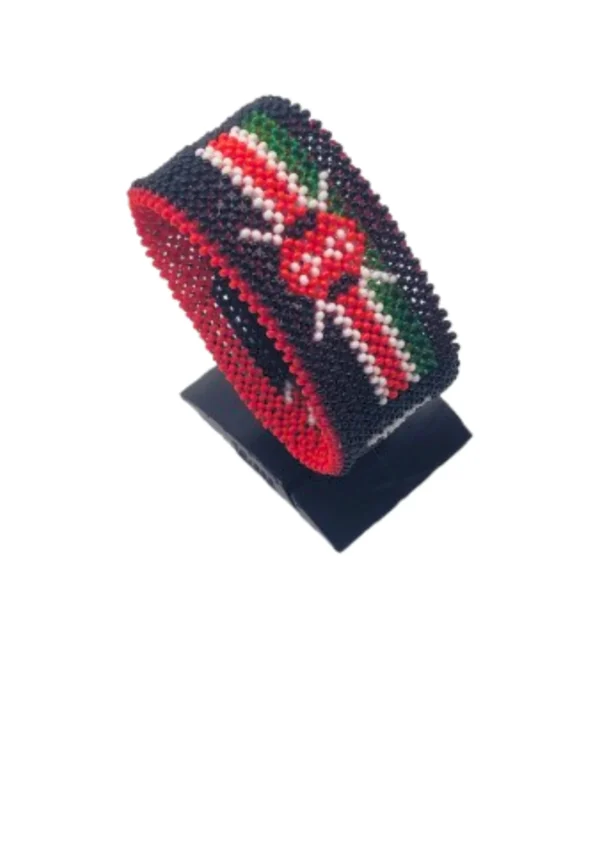 Kenya flag bracelet handcrafted in authentic flag colors on Black Stand.
