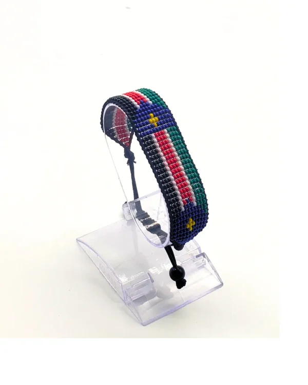 South Sudan flag bracelet handcrafted in authentic flag colors on Clear Stand.