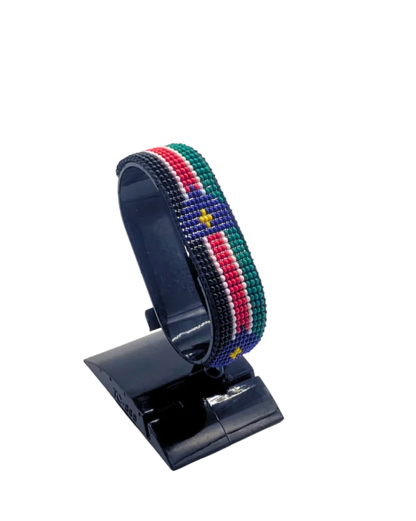 South Sudan flag bracelet handcrafted in authentic flag colors on Black Stand.