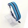 Handmade Botswana Adjustable Flag Bracelet featuring the colors of the Botswana flag on an adjustable bracelet.