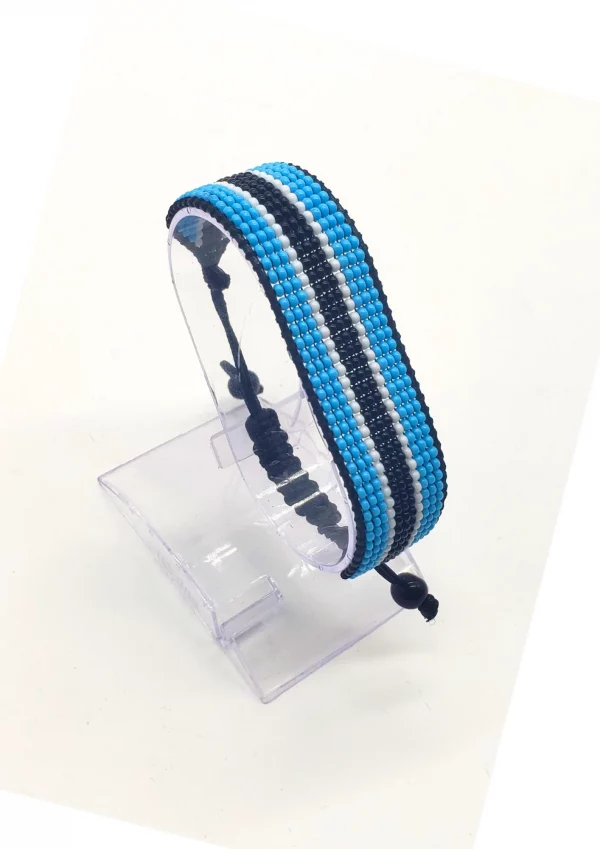 Handmade Botswana Adjustable Flag Bracelet featuring the colors of the Botswana flag on an adjustable bracelet.
